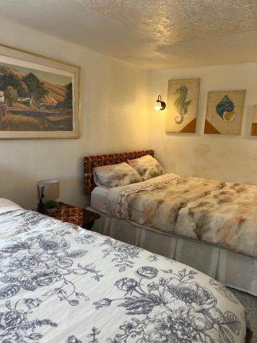 Postel nebo postele na pokoji v ubytování 'Ataongo Residence