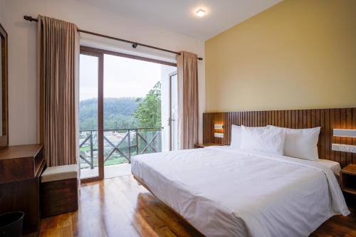 Postel nebo postele na pokoji v ubytování Celadon Villa