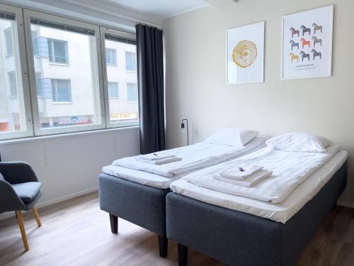 Postel nebo postele na pokoji v ubytování Stunning 2 BR Apartment In The City Centre