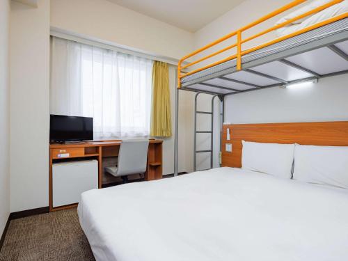 Postel nebo postele na pokoji v ubytování Comfort Inn Kofu Isawa