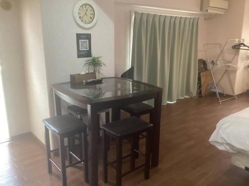 Cama o camas de una habitación en プリンスプラージュ211