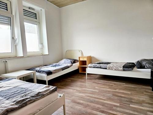 Ένα ή περισσότερα κρεβάτια σε δωμάτιο στο Apartments Leverkusen