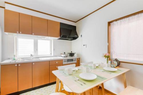 Dapur atau dapur kecil di Detached House around Metro Tamade Station 4LDK