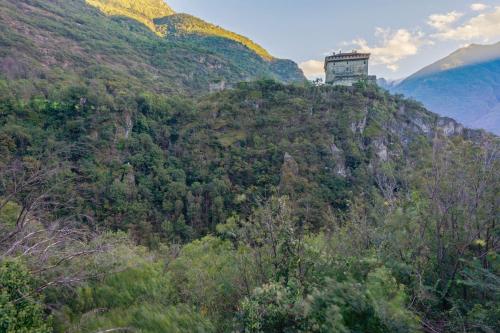 a building on the side of a mountain at Villa Tanya in Verrès