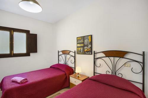 Postel nebo postele na pokoji v ubytování House La cabaa Galdar