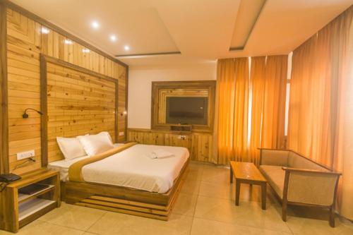 Кровать или кровати в номере WOW STAYZ2 Hotel The Lodge