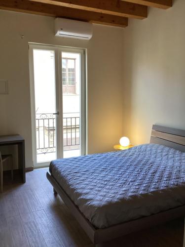 Postel nebo postele na pokoji v ubytování B&B Garibaldi