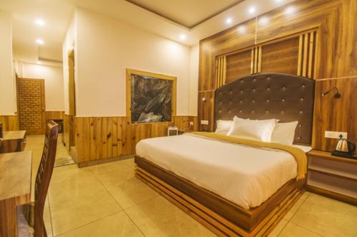 Кровать или кровати в номере WOW STAYZ2 Hotel The Lodge
