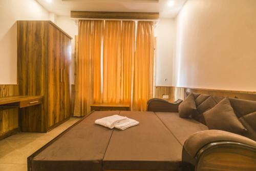 Кровать или кровати в номере WOW STAYZ2 Hotel The Lodge