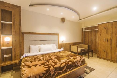Кровать или кровати в номере WOW STAYZ2 Hotel The Lodge