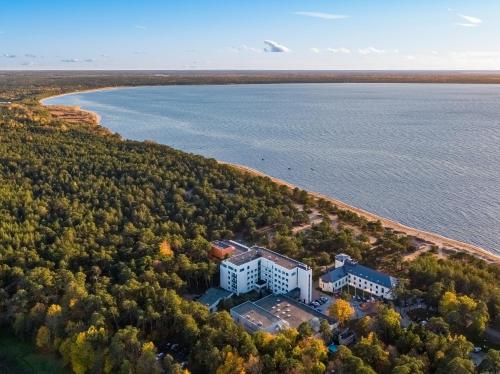 an aerial view of a building next to the water at LaSpa in Laulasmaa