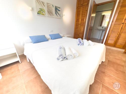 Postel nebo postele na pokoji v ubytování Apartamentos Annabel's II