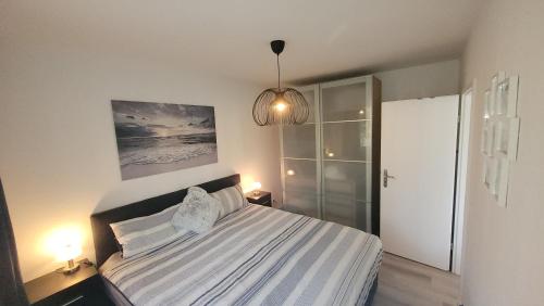 Postel nebo postele na pokoji v ubytování Meeresstrand - chic & renoviert!