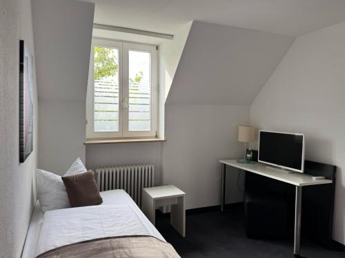 Ένα ή περισσότερα κρεβάτια σε δωμάτιο στο Eisberg Hotel Schwanen