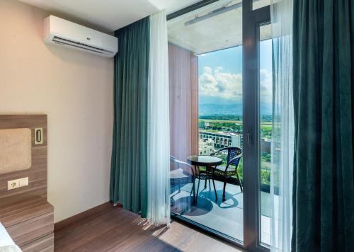 Rainbow Residenceにあるバルコニーまたはテラス