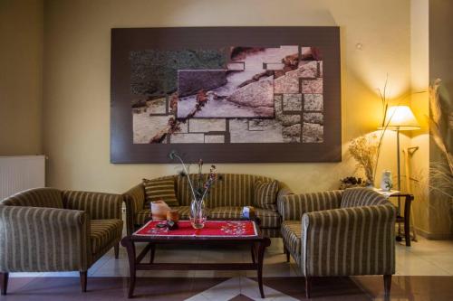 Χώρος καθιστικού στο Hotel Nessos