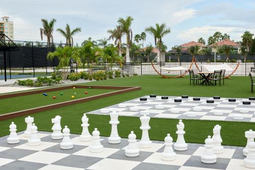 a giant chessboard in a park with a playground at Palmetto Marriott Resort & Spa in Palmetto