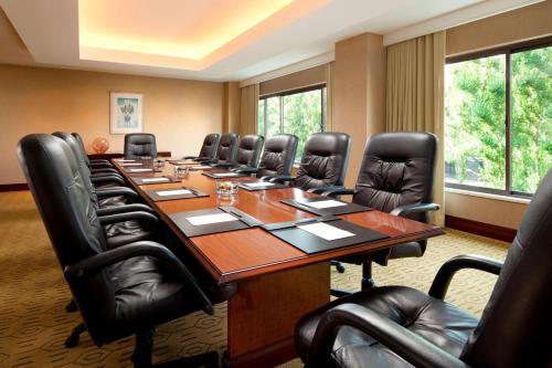 a conference room with a long table and leather chairs at The Westin South Coast Plaza, Costa Mesa in Costa Mesa