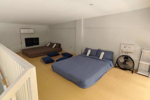 Ένα ή περισσότερα κρεβάτια σε δωμάτιο στο Casa Calungsod La Union