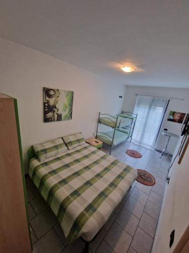 Postel nebo postele na pokoji v ubytování B&B Zia Vivina