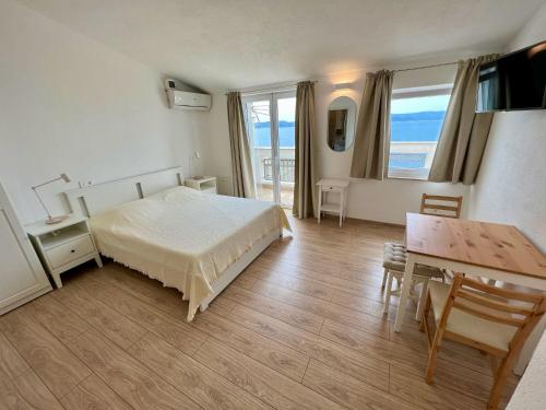 Posteľ alebo postele v izbe v ubytovaní Apartment Via
