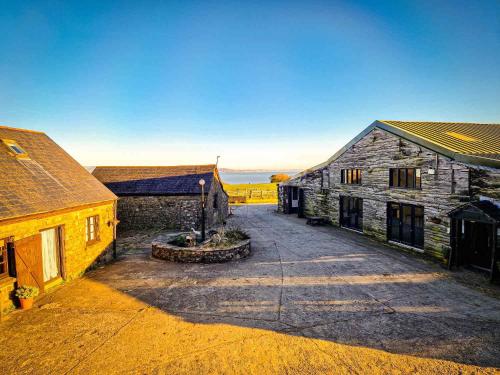 an aerial view of an old stone building at Clyne Farm Centre in The Mumbles