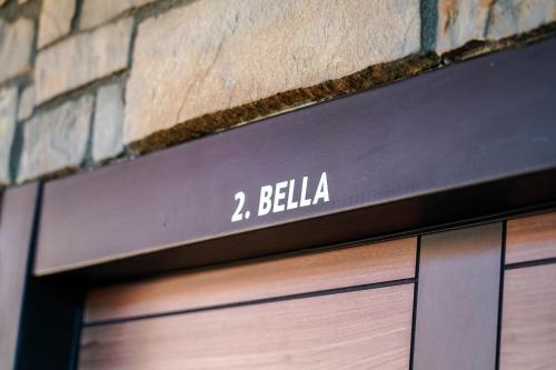 a garage door with the words belka on it at Maksimilijan Winery Apartments & wine tasting in Pepelište