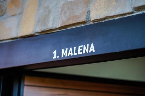 a sign that says malena on a brick wall at Maksimilijan Winery Apartments & wine tasting in Pepelište