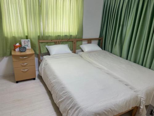 Postel nebo postele na pokoji v ubytování Clover House 大人数向け一軒家