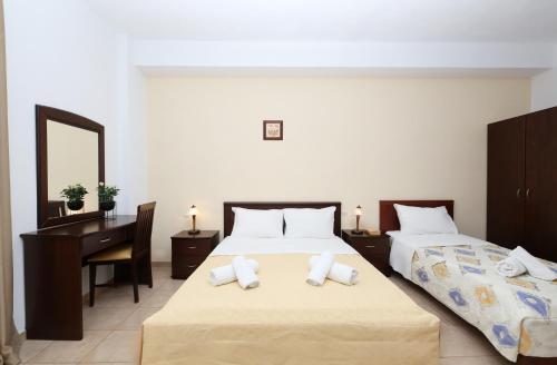 Palirria Hotel & Studiosにあるベッド