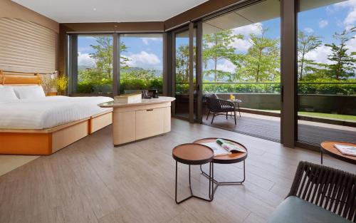 Ένα ή περισσότερα κρεβάτια σε δωμάτιο στο WM Hotel Hong Kong, Vignette Collection