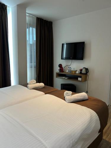 Comfort Hotelにあるベッド