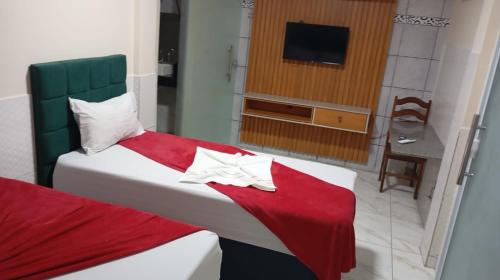 Postel nebo postele na pokoji v ubytování Hotel Sebastian