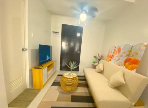 Televisyen dan/atau pusat hiburan di Rafaela Haven Condo