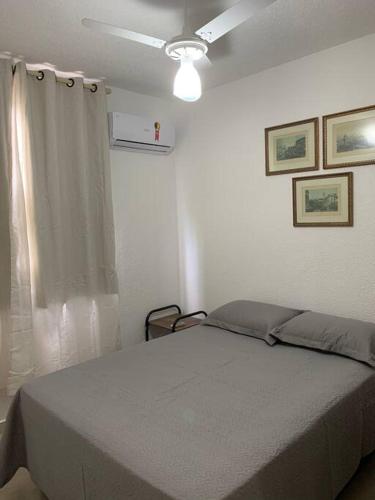 Cama o camas de una habitación en Ap Aconchegante Catanduva II