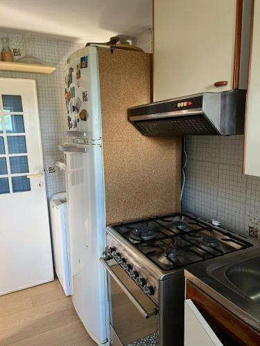 Una cocina o zona de cocina en Casetta nel borgo