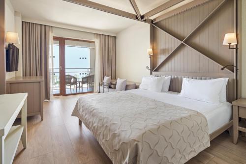 Postel nebo postele na pokoji v ubytování Voyage Sorgun Hotel