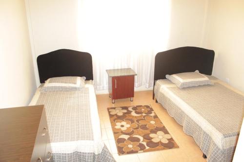 Cama o camas de una habitación en Millie Apartments Ntinda Kampala