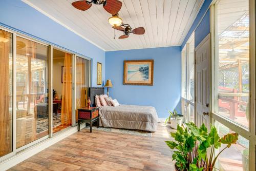 a bedroom with a bed and a ceiling fan at Spacious Plant City Home 1 Mi to Dtwn in Plant City