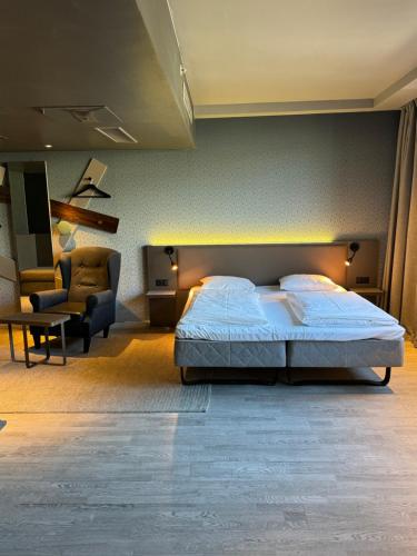 En eller flere senge i et værelse på Comfort Hotel Xpress Central Station