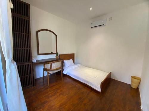 Ένα ή περισσότερα κρεβάτια σε δωμάτιο στο Cabana Surf and Stay