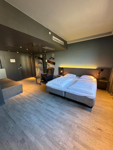 En eller flere senge i et værelse på Comfort Hotel Xpress Central Station