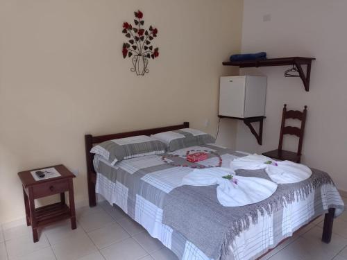 Ein Bett oder Betten in einem Zimmer der Unterkunft Pousada Astro Rei Paraty
