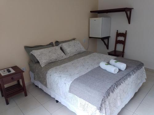 Ein Bett oder Betten in einem Zimmer der Unterkunft Pousada Astro Rei Paraty