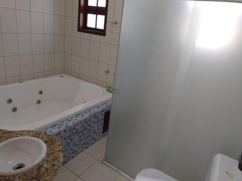 Ein Badezimmer in der Unterkunft Pousada Astro Rei Paraty