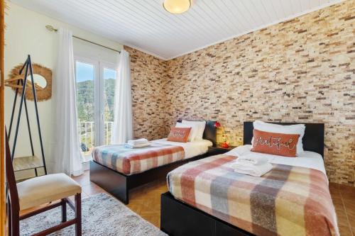 Postel nebo postele na pokoji v ubytování Landure by Homie