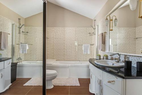 Koupelna v ubytování Landure by Homie