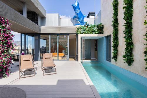 Πισίνα στο ή κοντά στο Cosmo Suite Penthouse
