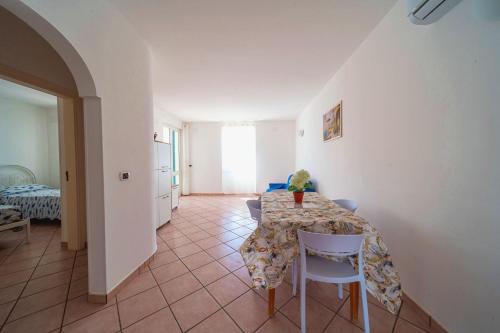 RESIDENCE OASI SUL MAREにあるベッド