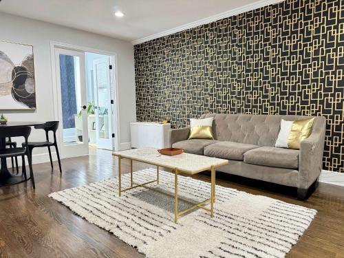 a living room with a couch and a table at City View Newly Renovated 3 Beds with Free Parking LM1809 in Atlanta